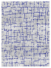 Cream abstract hand-knotted wool rug with navy blue crackle design.